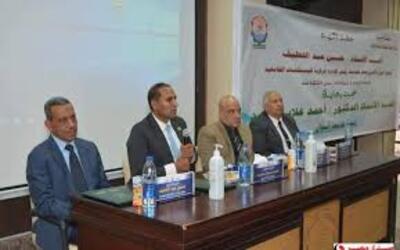 The President of Aswan University honors the Secretary General of the University for reaching the retirement age