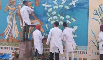 Students of Faculty of Archeology decorate two murals at the airport entrance, on Sahari road