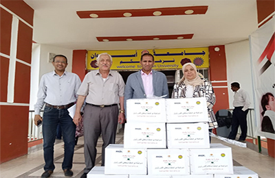 جامعة أسوان تدعم العمالة غير المنتظمة بمواد غذائية